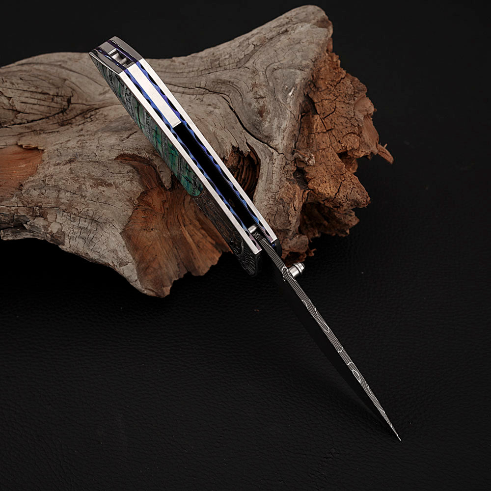 Hand-engraved Folding Knife Damascus Steel, Mammoth Tusks