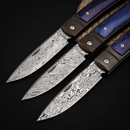 Custom Drop Point Pocket Knife in Damasteel, Blue
