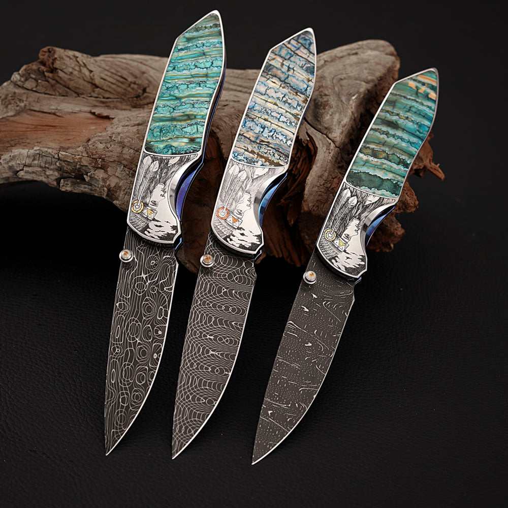 Hand-engraved Folding Knife Damascus Steel, Mammoth Tusks