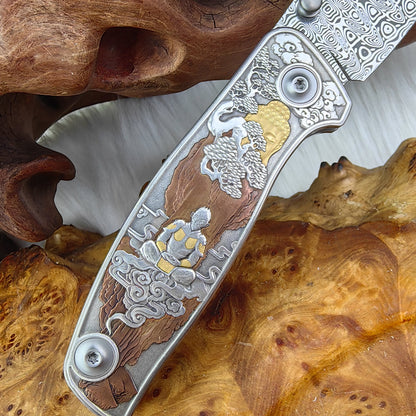 WUKONG Hand-engraved Pocketknife with 24K Gold Inlays and Damasteel Blade