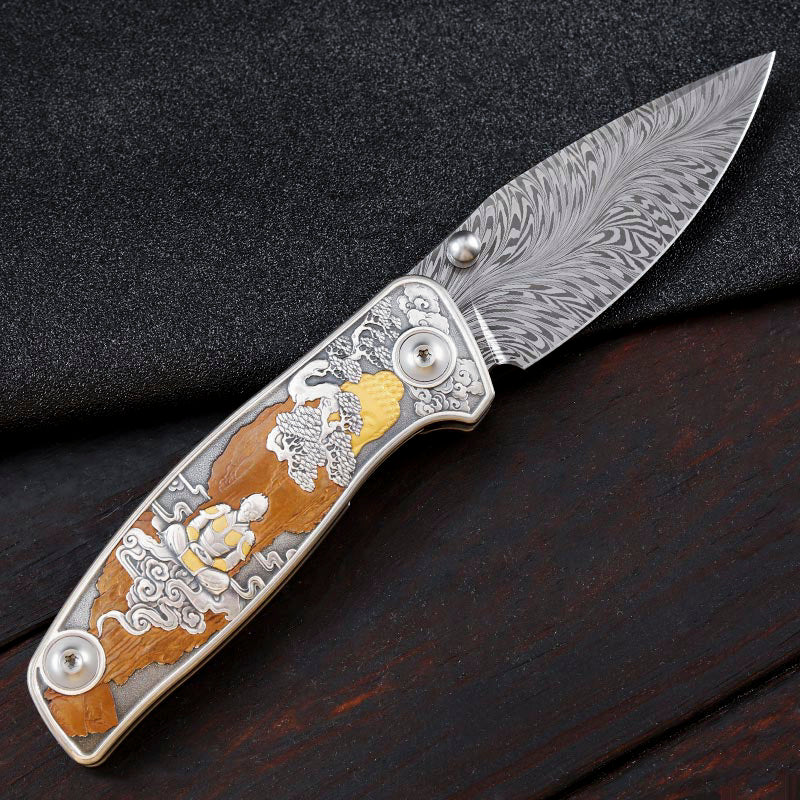 Monkey King Hand-Engraved Folder in Feather Damascus