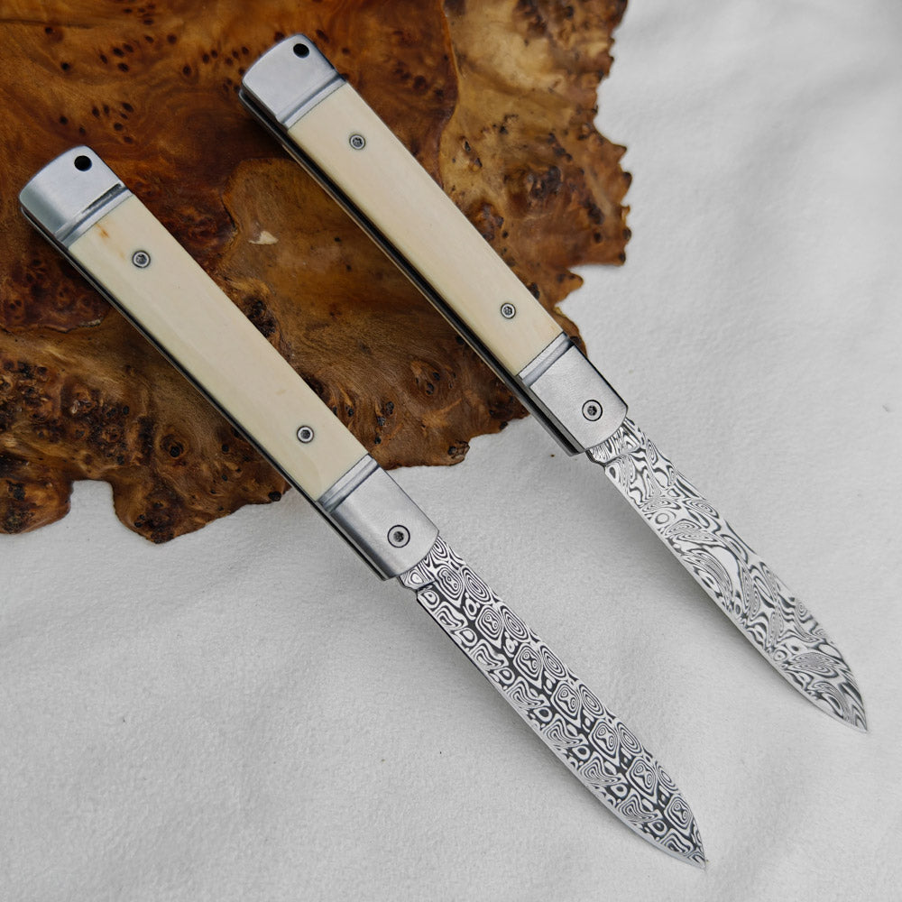 Pocket Knife in Damasteel with Mammoth Tusks