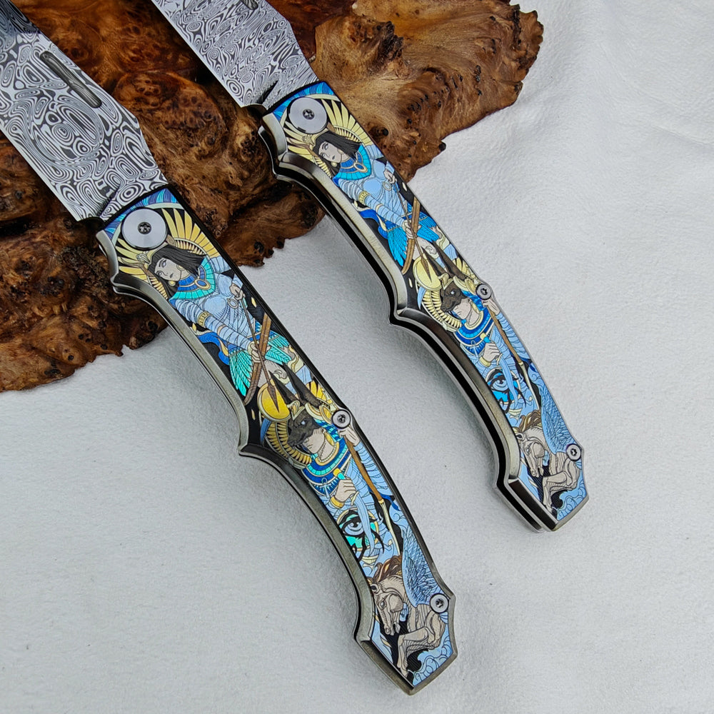 Anubis Pocket Knife Titanium 3D Coloured Sculpting - Damasteel