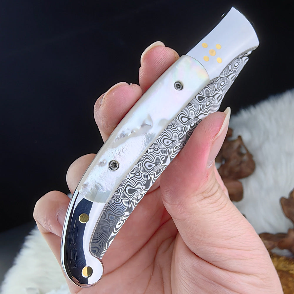 Custom Pocket Knife in Damasteel, Mother of Pearl