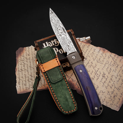 Custom Drop Point Pocket Knife in Damasteel, Blue