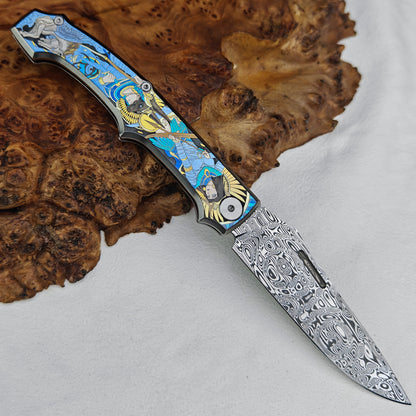 Anubis Pocket Knife Titanium 3D Coloured Sculpting - Damasteel