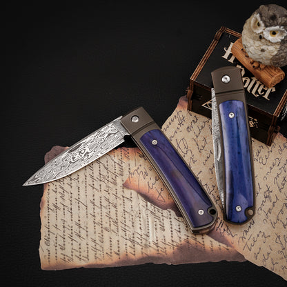 Custom Drop Point Pocket Knife in Damasteel, Blue
