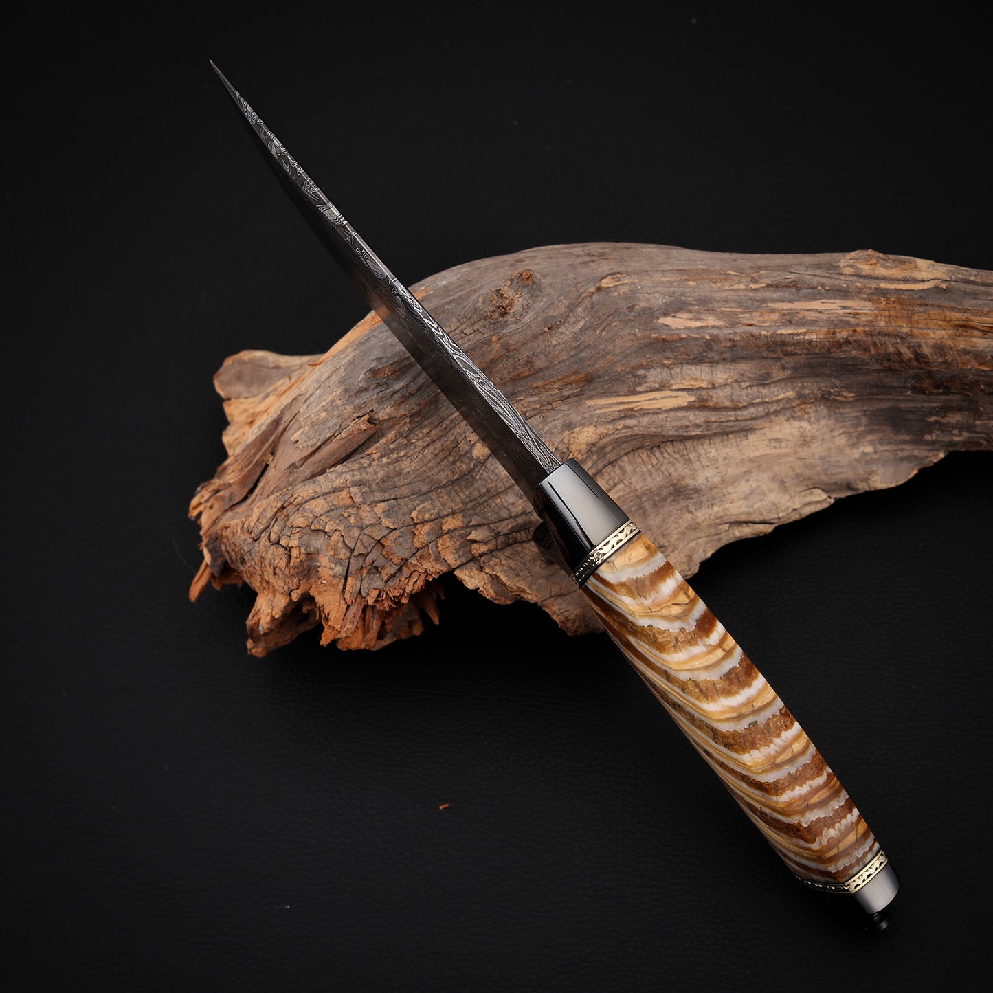 Damascus Hunter with Mammoth Tusks
