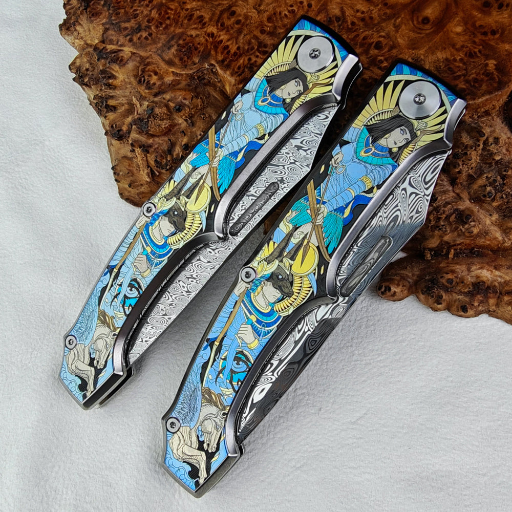 Anubis Pocket Knife Titanium 3D Coloured Sculpting - Damasteel