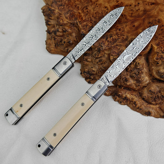 Pocket Knife in Damasteel with Mammoth Tusks