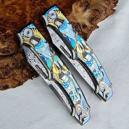 Anubis Pocket Knife Titanium 3D Coloured Sculpting - Damasteel