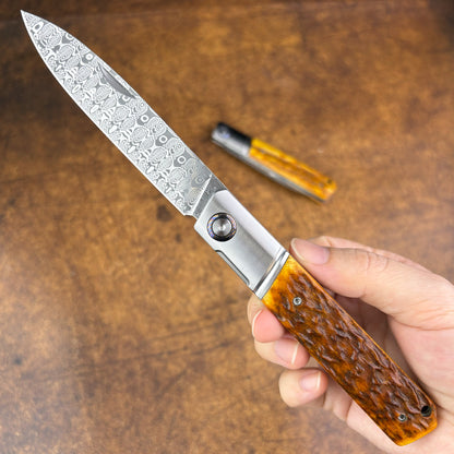 Pocket Knife in Damasteel with Buckhorn